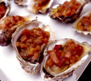 Local oysters topped with Kilpatrick bacon and worcestershire