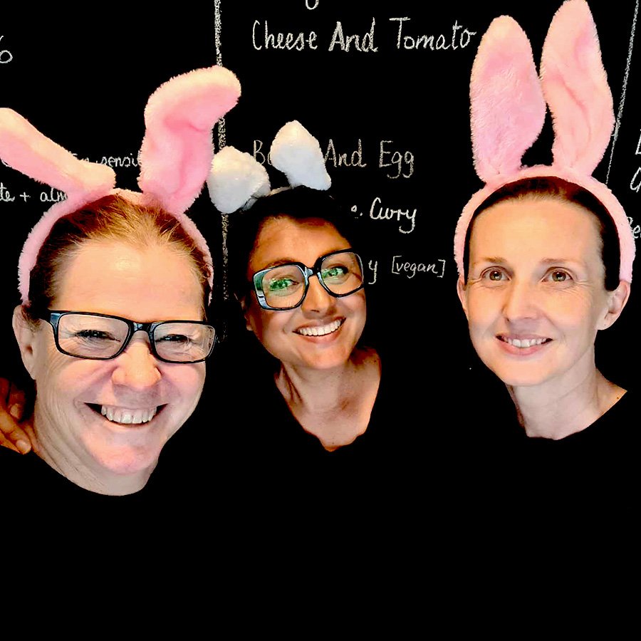 Sue, Lamese and Cat of Locomotive Station Tascott wearing bunny ear headbands.